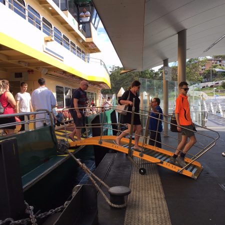Passengers disembarking from an Inner Harbour ferry at Balmain East